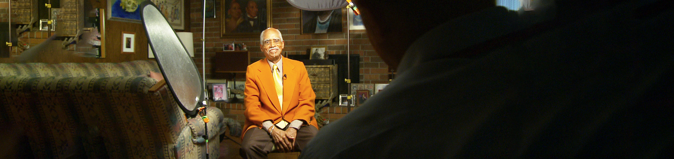 HistoryMaker sitting on set smiling and being interviewed